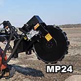 Close-up image of MP24 compaction wheel attached to a mini skid steer.